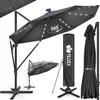 A display of a large cantilever umbrella, its cover, and a folded umbrella. Anteprima dell’immagine prodotto