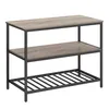 A three-tier shelving unit with a wood-grain top and shelves and a black metal frame. Náhled obrázku produktu