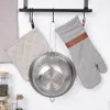 Kitchen items hanging on a rack. Náhľad obrázku produktu