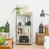 A metal shelving unit filled with decorative items and books, placed in a room setting. Podgląd zdjęcia produktu