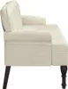 A side view of a cream-colored sofa with tufted backrest and rolled arms, resting on dark wooden legs. Náhled obrázku produktu