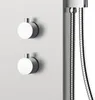 A close-up view of a modern shower fixture with two circular knobs and a flexible shower hose. Podgląd zdjęcia produktu