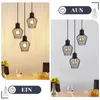 A split image showing a set of three pendant lights. The left side shows the lights on in a dimly lit room, and the right side shows them off in a brighter room. Both sides include decorative elements like vases and fruit bowls. Náhľad obrázku produktu