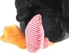A close-up view of a plush toy penguin's feet and lower body. Anteprima dell’immagine prodotto