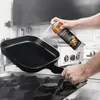 A person is spraying a grill pan with cooking spray over a stove. Produktbild-Vorschau