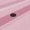A close-up view of a pink upholstered surface with a black electrical outlet integrated into it. Náhľad obrázku produktu