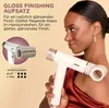 A woman is holding a white hairdryer with gold accents, with a close-up of an attachment shown in a circular inset. Text describes the product's features. Voir les images du produit