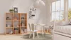 A bright and airy children's room with a wooden cube shelf, a small table and chairs, and a bed. Náhľad obrázku produktu