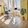 A home office setup with a desk, chair, and plant. Podgląd zdjęcia produktu