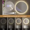 A circular LED mirror with touch controls and a demonstration of its lighting features. Anteprima dell’immagine prodotto
