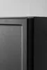 A close-up view of the corner of a dark gray cabinet. Náhled obrázku produktu