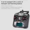 A remote control for a helicopter and fixed-wing airplane, with descriptive text about its features. Produktbild-Vorschau