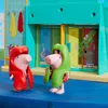Two Peppa Pig figures in towels stand in front of a locker room playset. Náhľad obrázku produktu