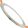 A close-up, angled studio shot of a round, flat LED recessed light fixture against a white background. Produktbild-Vorschau