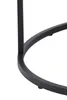 A close-up view of the black metal frame of a round side table. Produktbild-Vorschau