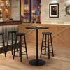 A bar or restaurant setting with a high table and stools. Náhľad obrázku produktu