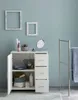 A bathroom cabinet with storage and decorative elements. Náhled obrázku produktu