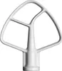 A white stand mixer attachment, likely a flat beater, is shown against a white background. Podgląd zdjęcia produktu