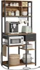 A kitchen baker's rack with various kitchen appliances and containers. Produktbild-Vorschau
