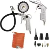 A collection of air compressor accessories, including a tire inflator with a gauge, an air duster gun, a coiled orange air hose, and various nozzles. Náhled obrázku produktu