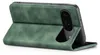 A green flip cover phone case for a Google Pixel 9 / 9 Pro is shown from the side, with the phone partially inserted and the cover folded back to act as a stand. Produktbild-Vorschau