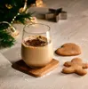 A festive scene with a drink and cookies, likely for the holidays. Náhľad obrázku produktu