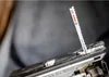 A close-up shot of a jigsaw blade inserted into a jigsaw. Voir les images du produit