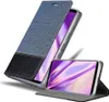 A flip-style phone case is shown, with the phone inside and the cover open. Náhled obrázku produktu