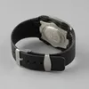 A close-up view of the back of a watch with a black strap and silver buckle. Náhled obrázku produktu