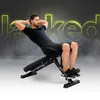 A man is performing a sit-up exercise on an adjustable weight bench. The word "Jacked" is displayed in large, glowing yellow letters in the background. Náhľad obrázku produktu
