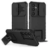 Three black phone cases are displayed against a white background. One case is shown from the back, another from the side, and the third is shown at an angle with its kickstand extended. Produktbild-Vorschau