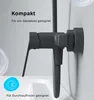 Close-up of a black shower faucet mounted on a white wall, with text overlays highlighting features. Produktbild-Vorschau