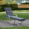 A gray chaise lounge cushion is placed on a chaise lounge in an outdoor setting with grass and trees in the background. Produktbild-Vorschau