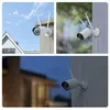 Collage of three images showing a white security camera mounted outdoors in different lighting conditions and settings. Produktbild-Vorschau