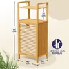 A bamboo bathroom shelf unit with a laundry basket, featuring dimensions and material information. Produktbild-Vorschau