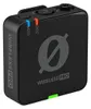 A black wireless microphone transmitter with a large gray logo and text. Náhľad obrázku produktu