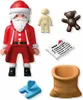 A collection of Playmobil Christmas-themed figures and accessories arranged on a white background. Náhľad obrázku produktu