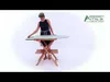 A woman is demonstrating an ironing board. Produktbild-Vorschau