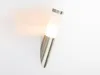 A modern outdoor wall light with a brushed metal base and a frosted glass shade, mounted on a white wall. Anteprima dell’immagine prodotto