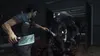 A man in a blue shirt and apron is fighting zombies with a cleaver in a building with a sign that says "CHAPEL". Produktbild-Vorschau