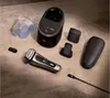 A collection of Braun Series 9 Pro+ electric shaver accessories laid out on a textured surface. Produktbild-Vorschau