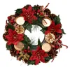 A Christmas advent wreath with candles, pinecones, poinsettias, and berries. Podgląd zdjęcia produktu