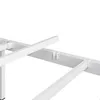 A close-up view of the white metal frame of a bed. Produktbild-Vorschau