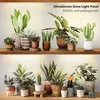 Two shelves filled with various potted plants, illuminated by grow lights. Anteprima dell’immagine prodotto