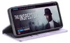 A smartphone in a purple flip case is displayed, showing a movie streaming interface on its screen. Produktbild-Vorschau