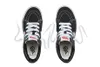 A top-down view of two black Vans Sk8-Hi sneakers with white laces. Podgląd zdjęcia produktu