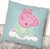 A cartoon pig character on a light blue pillow. Produktbild-Vorschau