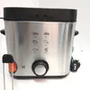 A silver and black deep fryer with cooking instructions printed on the side. Produktbild-Vorschau