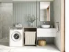 A modern laundry room or bathroom with a washing machine, sink, and storage unit. Voir les images du produit
