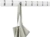 A white wall-mounted coat rack with silver accents, holding a grey bag. Podgląd zdjęcia produktu